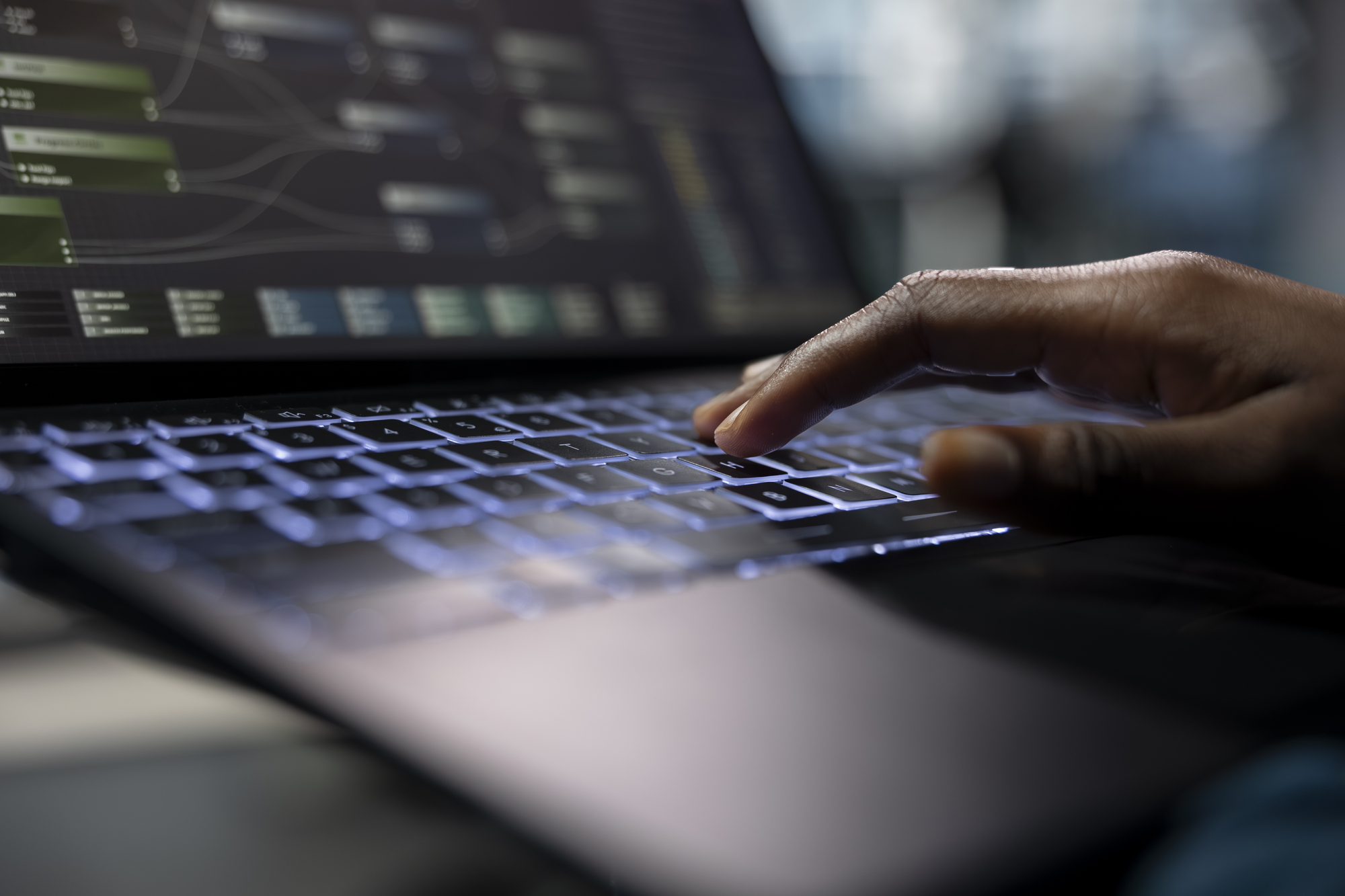 server-room-programmer-coding-laptop-typing-keyboard-close-up (1)